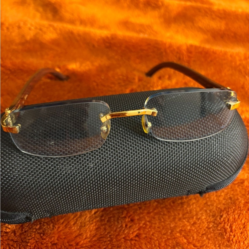 Cartier Gold and Black Rimless Sunglasses